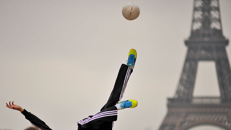 Interesting and unique photo of the Eiffel Tower, Adidas were filming an advert with DSLR cameras and footballers playing with balls