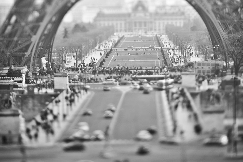 Free lensing, with Nikon and a 135mm lens, image of the base of the Eiffel tower