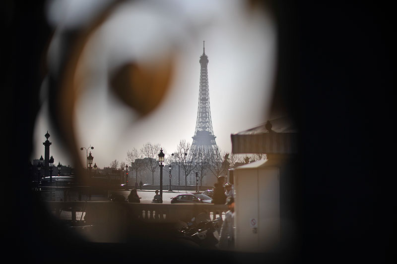 Through a gate, of the Eiffel Tower, Bokeh